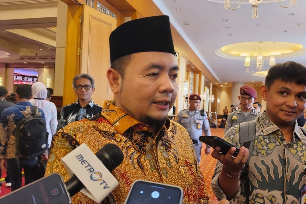 Ketua KPU RI, Afifuddin saat ditemui di Hotel Ritz Carlton, Jakarta, Jumat (20/12/2024)(Foto/SINGGIH WIRYONO/Kompas.com)